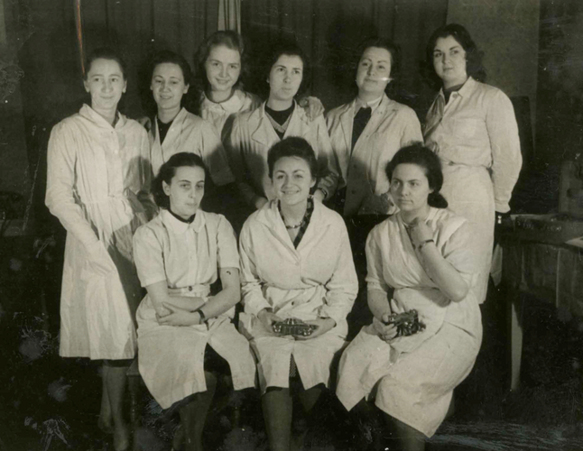 Gruppenbild von Frauen in weißen Kitteln